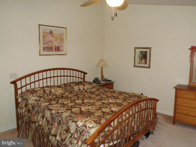 515 Tulip Road Riva, MD 21140 - Photo 19 of 30 a bedroom with a bed and a dresser