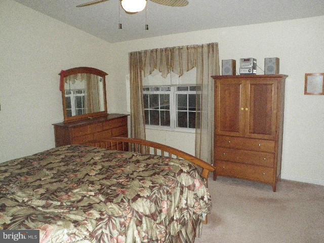 515 Tulip Road Riva, MD 21140 - Photo 20 of 30 a bedroom with a bed and a dresser