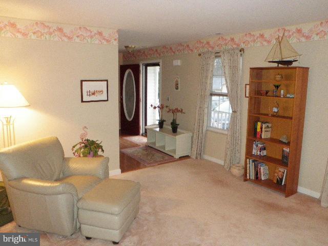 515 Tulip Road Riva, MD 21140 - Photo 3 of 30 a living room with furniture and a dining table