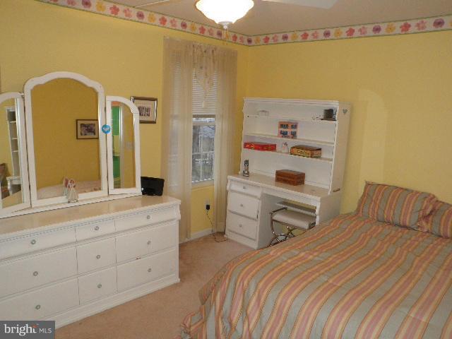 515 Tulip Road Riva, MD 21140 - Photo 21 of 30 a bedroom with a bed and a dresser
