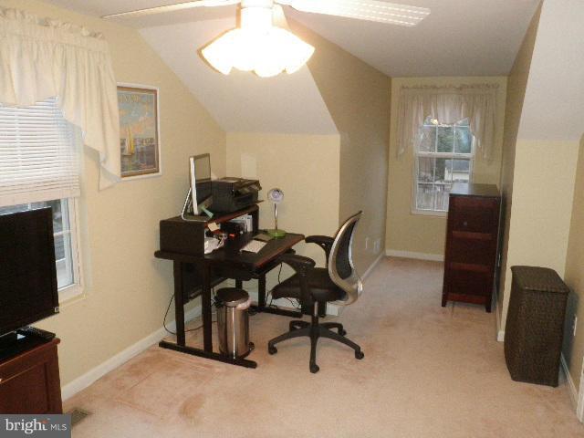 515 Tulip Road Riva, MD 21140 - Photo 25 of 30 a view of a workspace with furniture and a fireplace