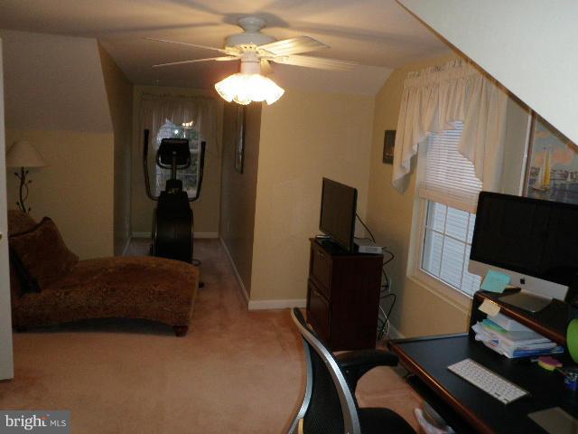 515 Tulip Road Riva, MD 21140 - Photo 26 of 30 a bedroom with a bed and a flat screen tv
