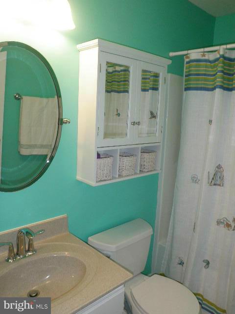 515 Tulip Road Riva, MD 21140 - Photo 27 of 30 a bathroom with a sink and mirror