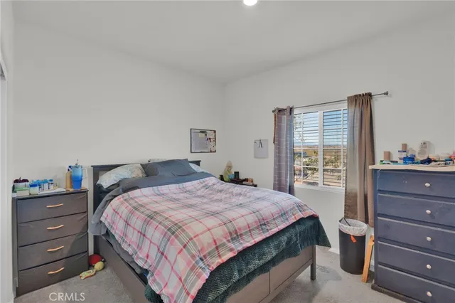 a bathroom with a toilet sink and shower