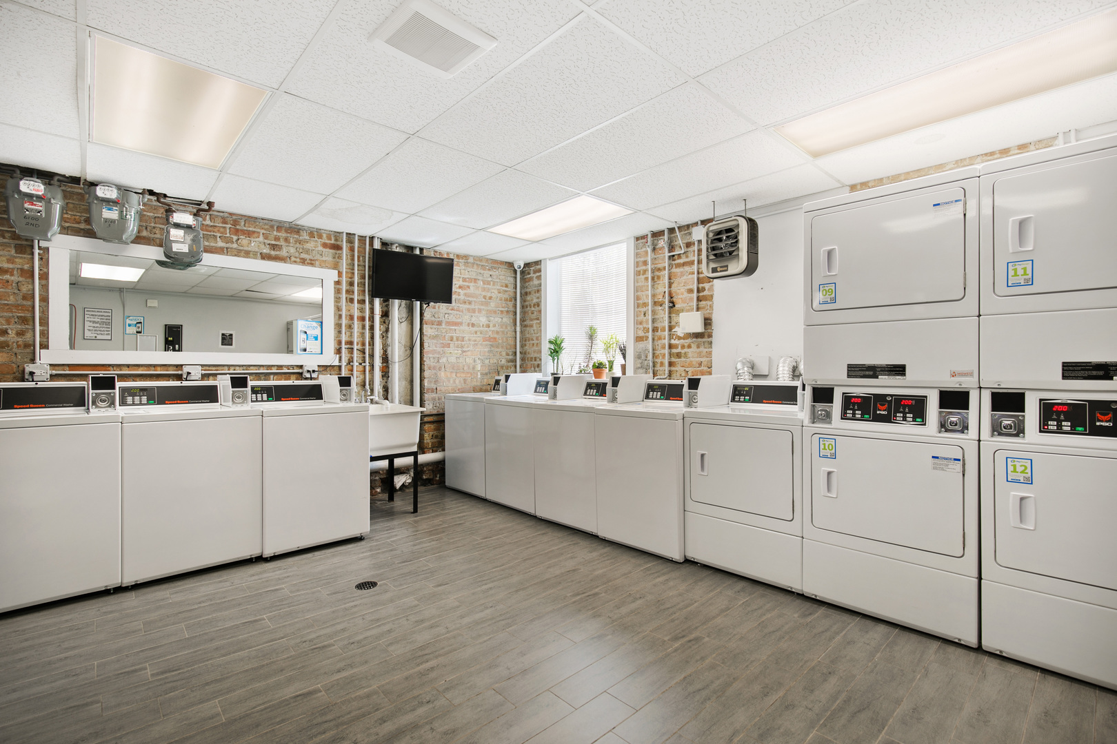 6109 North Winthrop Avenue, Unit 2 Chicago, IL 60660 - Photo 15 of 15 a kitchen with cabinets a sink and appliances