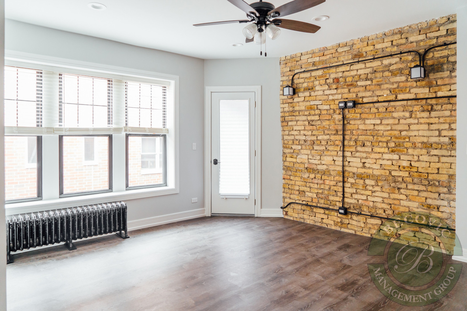 6109 North Winthrop Avenue, Unit 2 Chicago, IL 60660 - Photo 2 of 15 a view of an empty room with a window