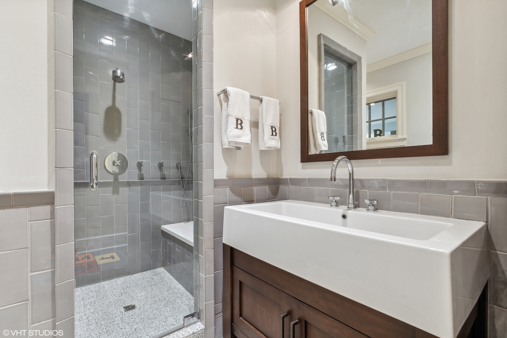346 Grove Street Glencoe, IL 60022 - Photo 23 of 61 a bathroom with a sink a toilet and shower