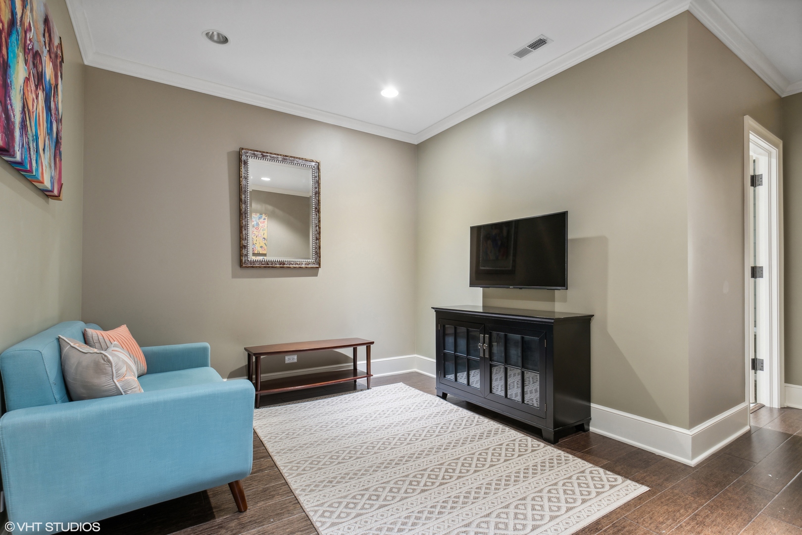 346 Grove Street Glencoe, IL 60022 - Photo 34 of 61 a living room with furniture and a flat screen tv