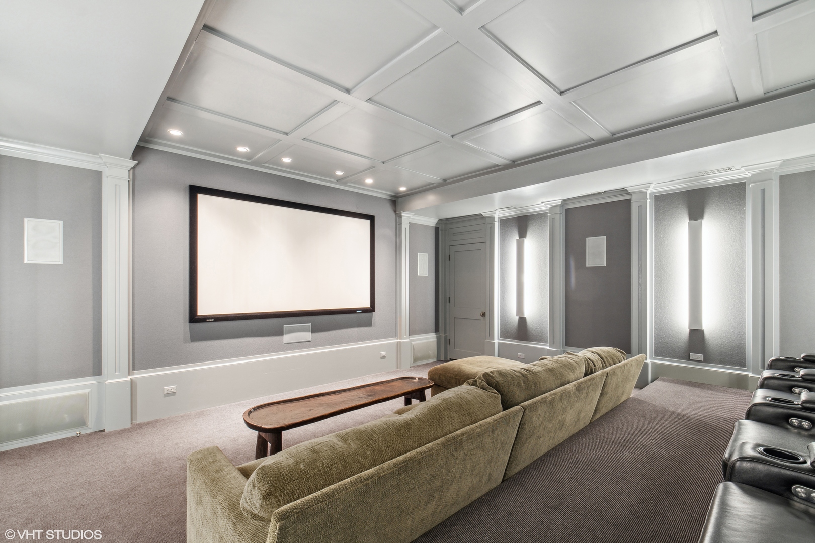346 Grove Street Glencoe, IL 60022 - Photo 36 of 61 a living room with furniture a projector and a flat screen tv