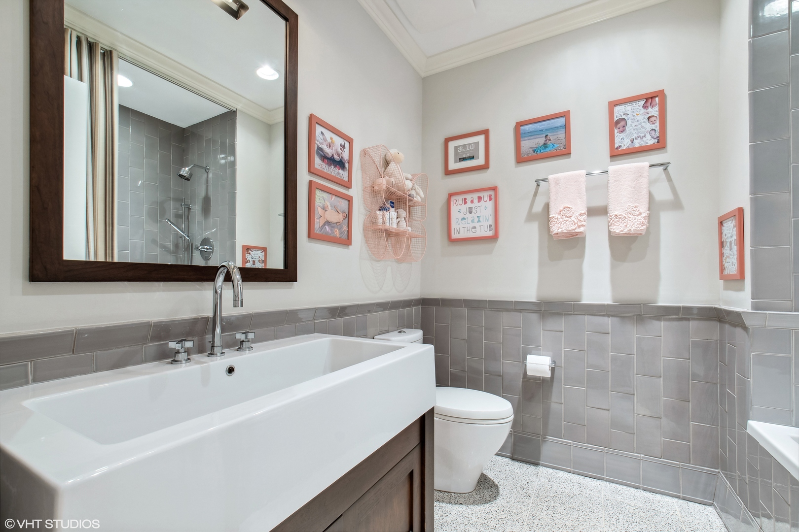 346 Grove Street Glencoe, IL 60022 - Photo 39 of 61 a bathroom with a sink mirror and toilet