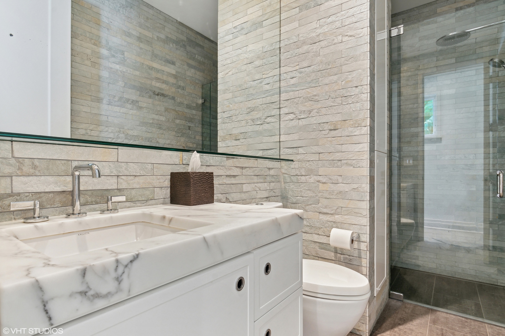 346 Grove Street Glencoe, IL 60022 - Photo 54 of 61 a bathroom with a sink toilet and shower