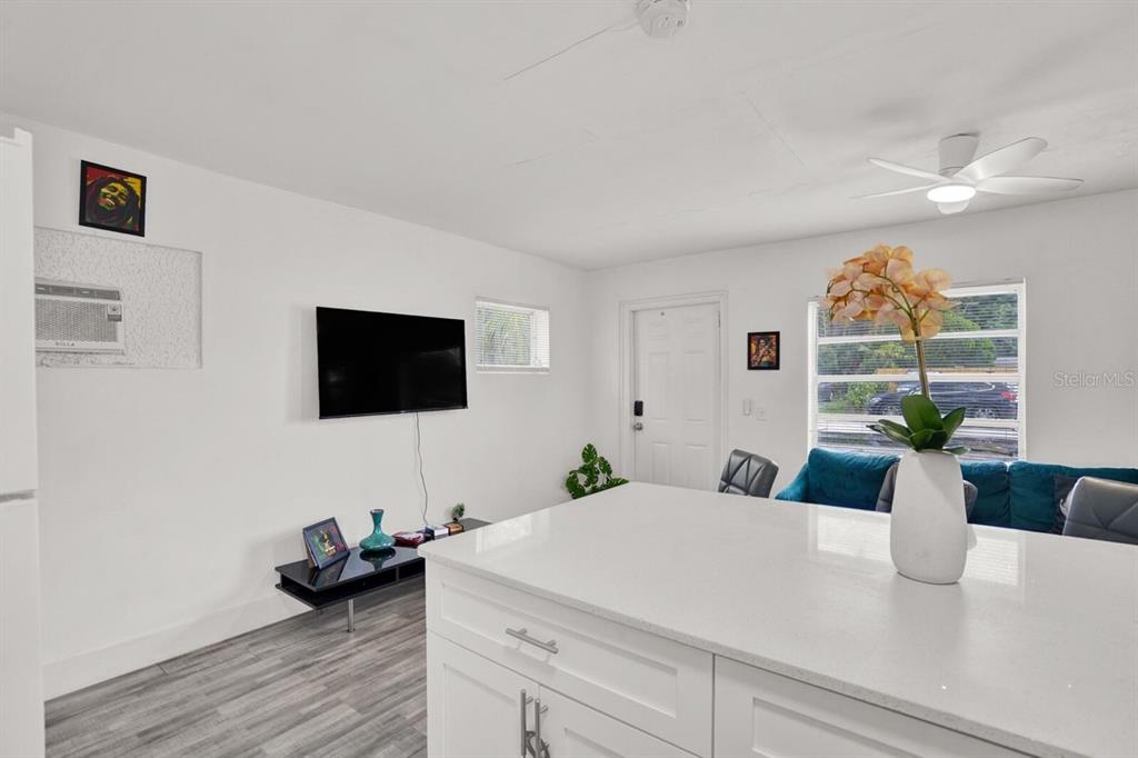 7871 Terrace Road Lantana, FL 33462 - Photo 14 of 19 a living room with furniture and a flat screen tv