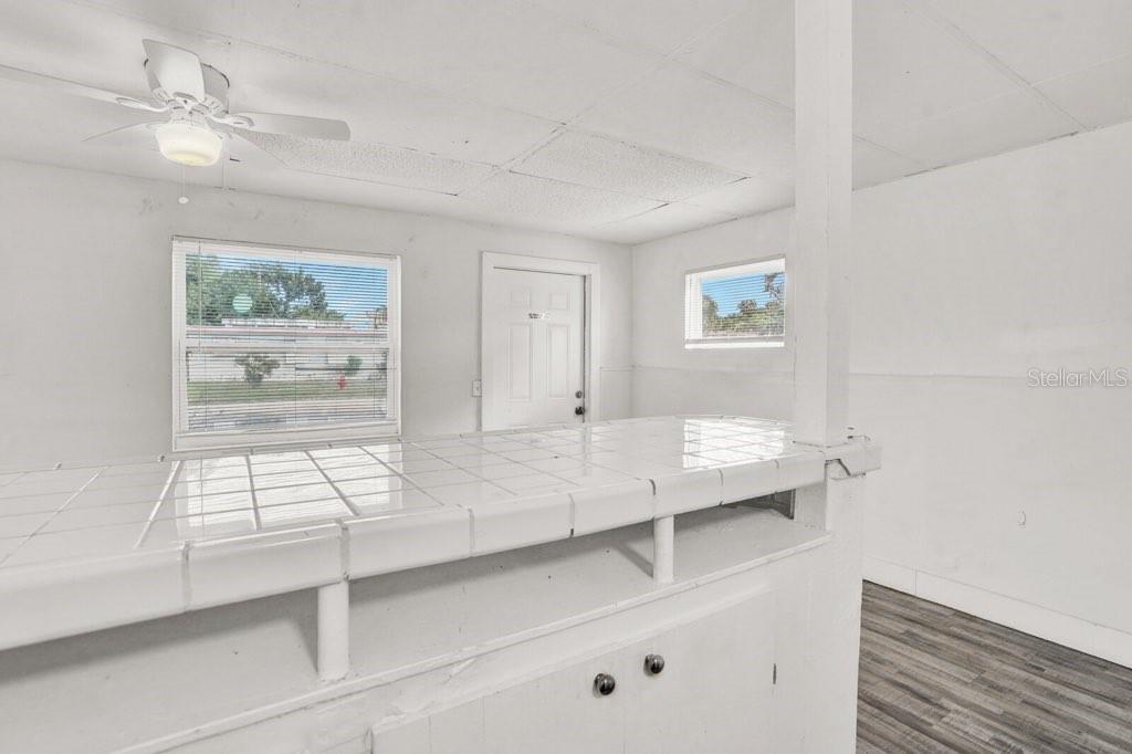 7871 Terrace Road Lantana, FL 33462 - Photo 3 of 19 a view of living room with furniture and window