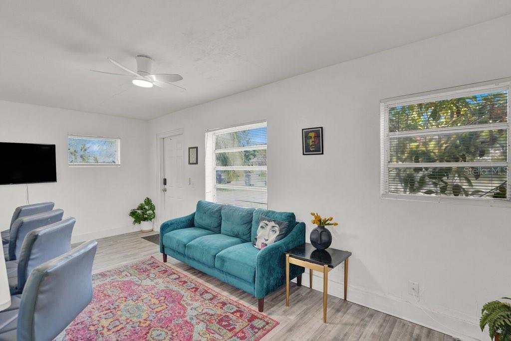 7871 Terrace Road Lantana, FL 33462 - Photo 10 of 19 a living room with furniture and a flat screen tv