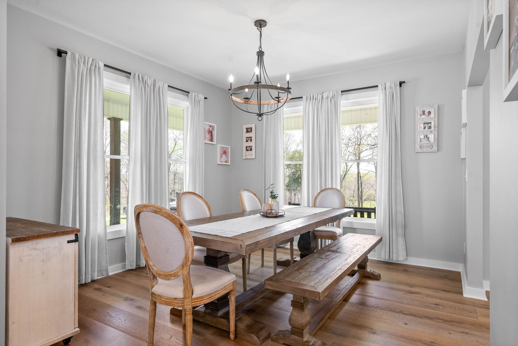 234 Davis Lane Erin, TN 37061 - Photo 17 of 45 a view of a dining room with furniture window and wooden floor
