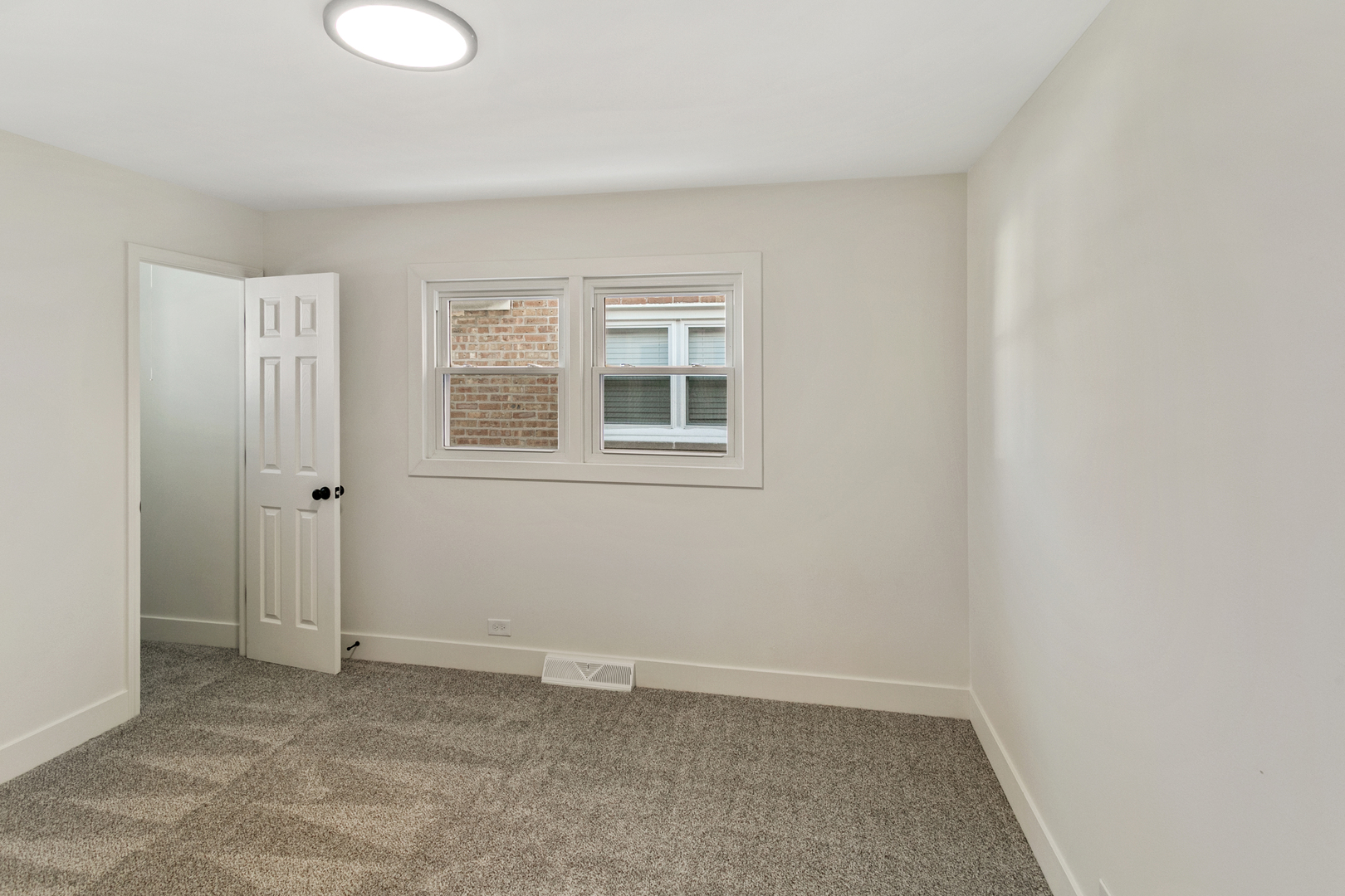 7021 West 64th Street Chicago, IL 60638 - Photo 11 of 23 an empty room with windows