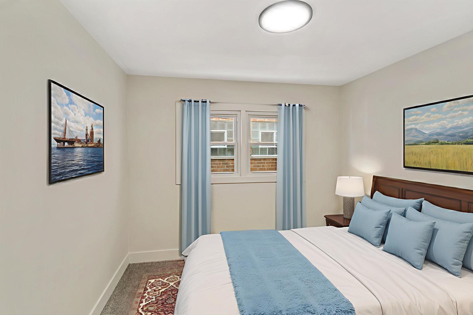 7021 West 64th Street Chicago, IL 60638 - Photo 15 of 23 a bedroom with a bed and a window