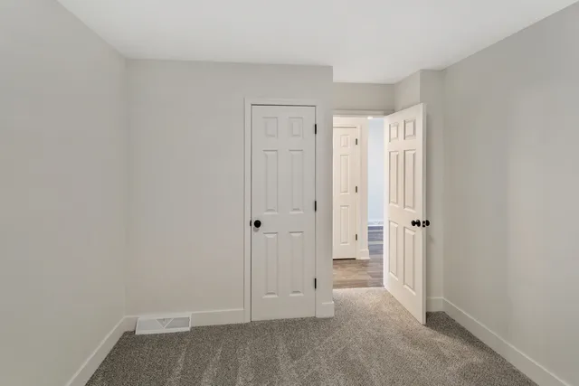 a view of room with hardwood floor
