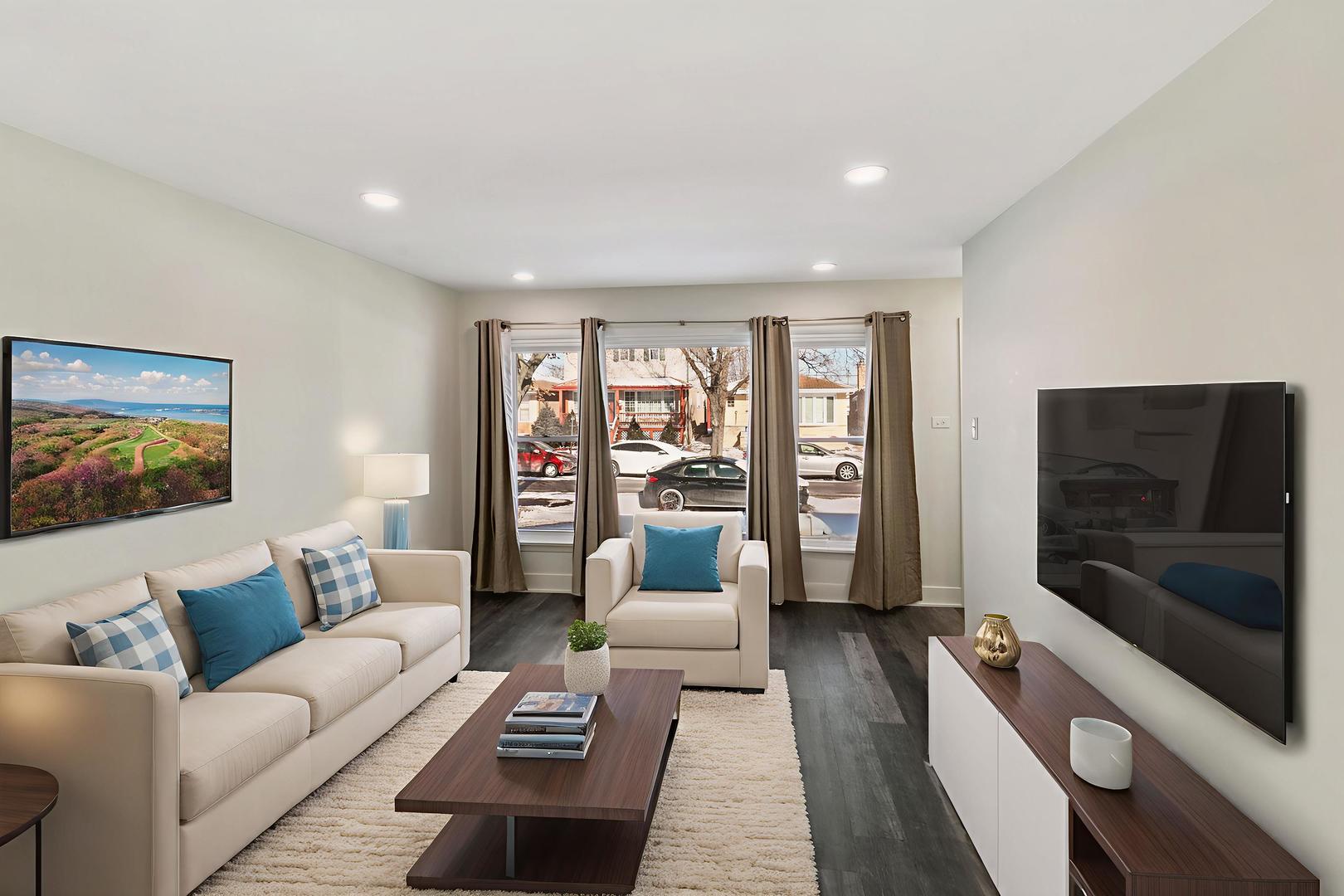 7021 West 64th Street Chicago, IL 60638 - Photo 8 of 23 a living room with furniture and a flat screen tv