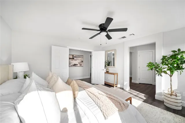 a dining room with furniture and wooden floor