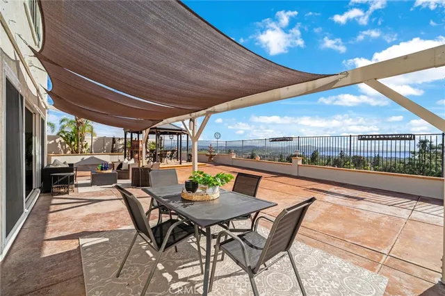 a view of balcony with furniture