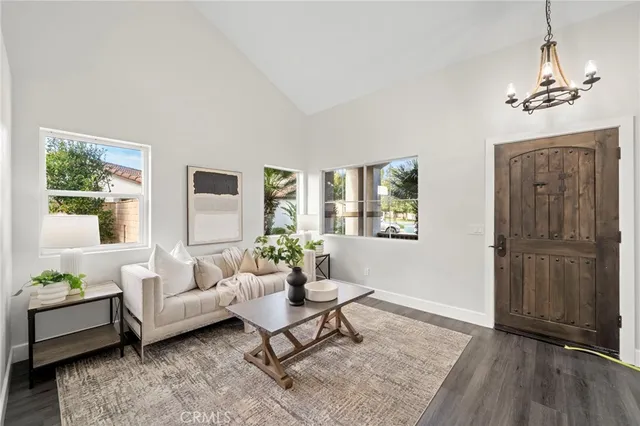 a living room with furniture and window