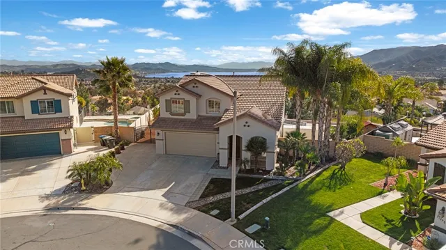 an aerial view of a house with swimming pool