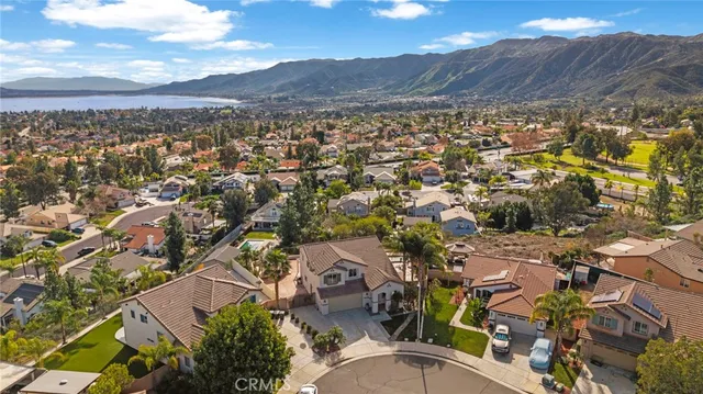 an aerial view of residential houses and outdoor space