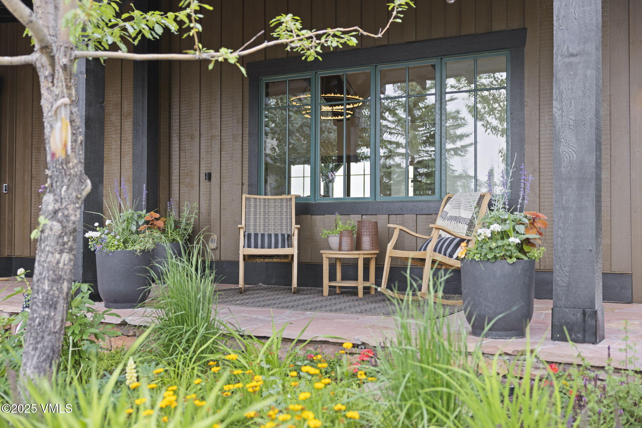 254 Pine Marten Way Edwards, CO 81632 - Photo 19 of 46 a view of a chair and table in back yard of the house