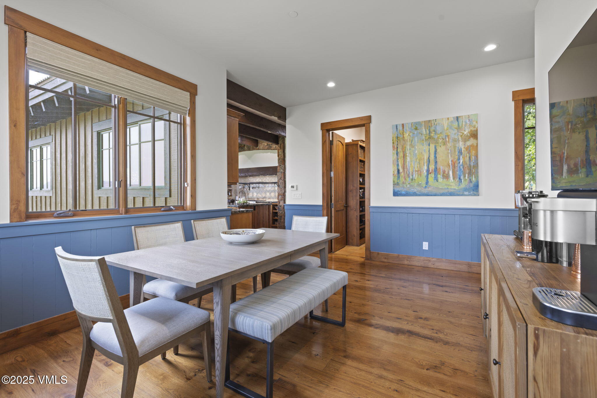 254 Pine Marten Way Edwards, CO 81632 - Photo 24 of 46 a view of a dining room with furniture window and wooden floor