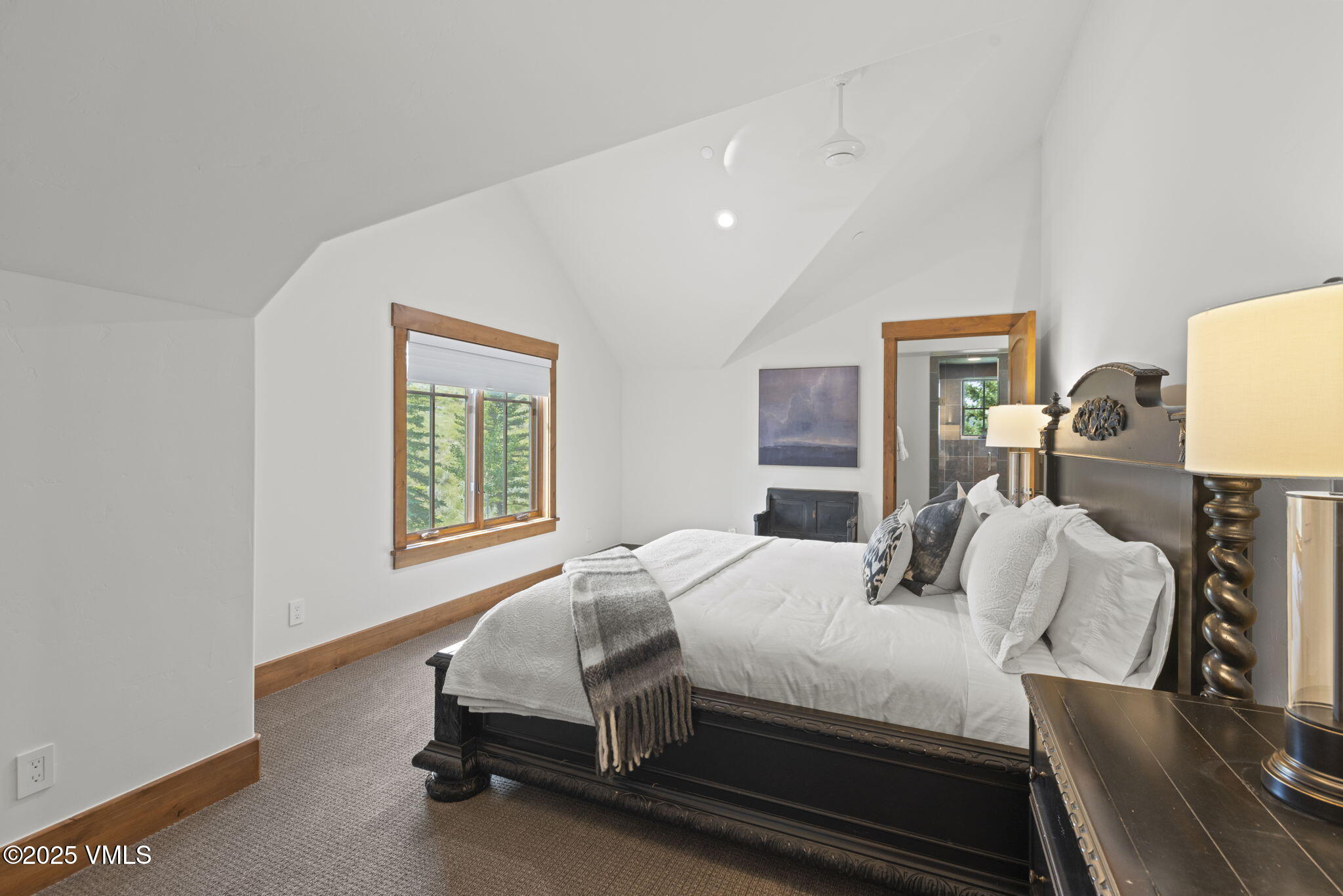 254 Pine Marten Way Edwards, CO 81632 - Photo 34 of 46 a bedroom with a bed chair and window