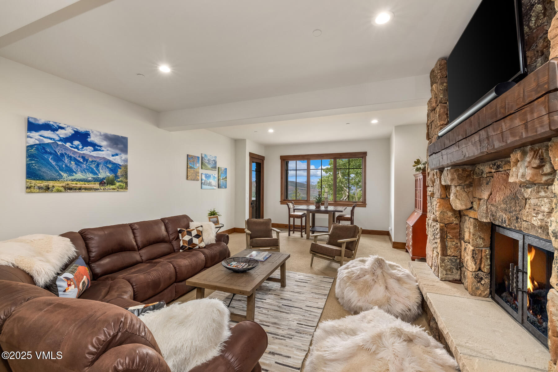 254 Pine Marten Way Edwards, CO 81632 - Photo 36 of 46 a living room with fireplace furniture and a flat screen tv