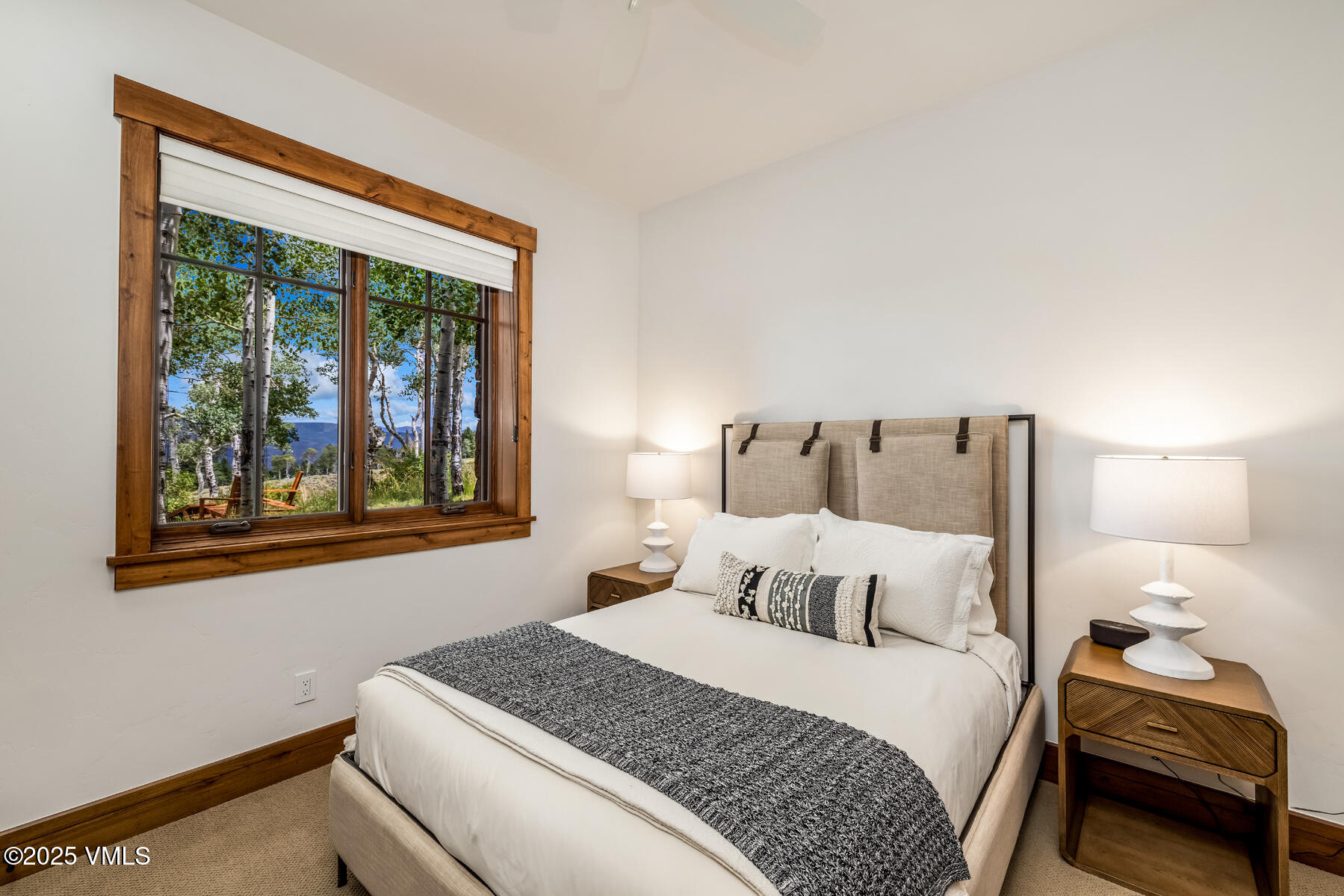 254 Pine Marten Way Edwards, CO 81632 - Photo 38 of 46 a bedroom with a bed and window