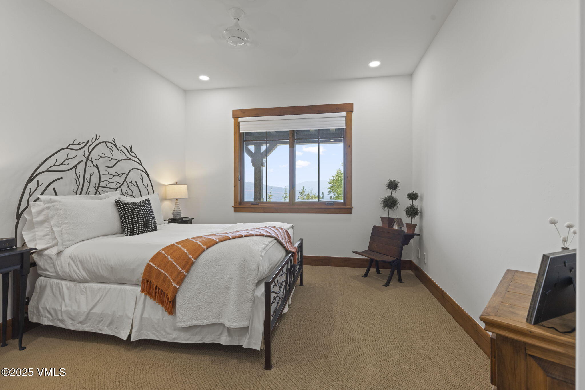 254 Pine Marten Way Edwards, CO 81632 - Photo 41 of 46 a bedroom with a bed and furniture