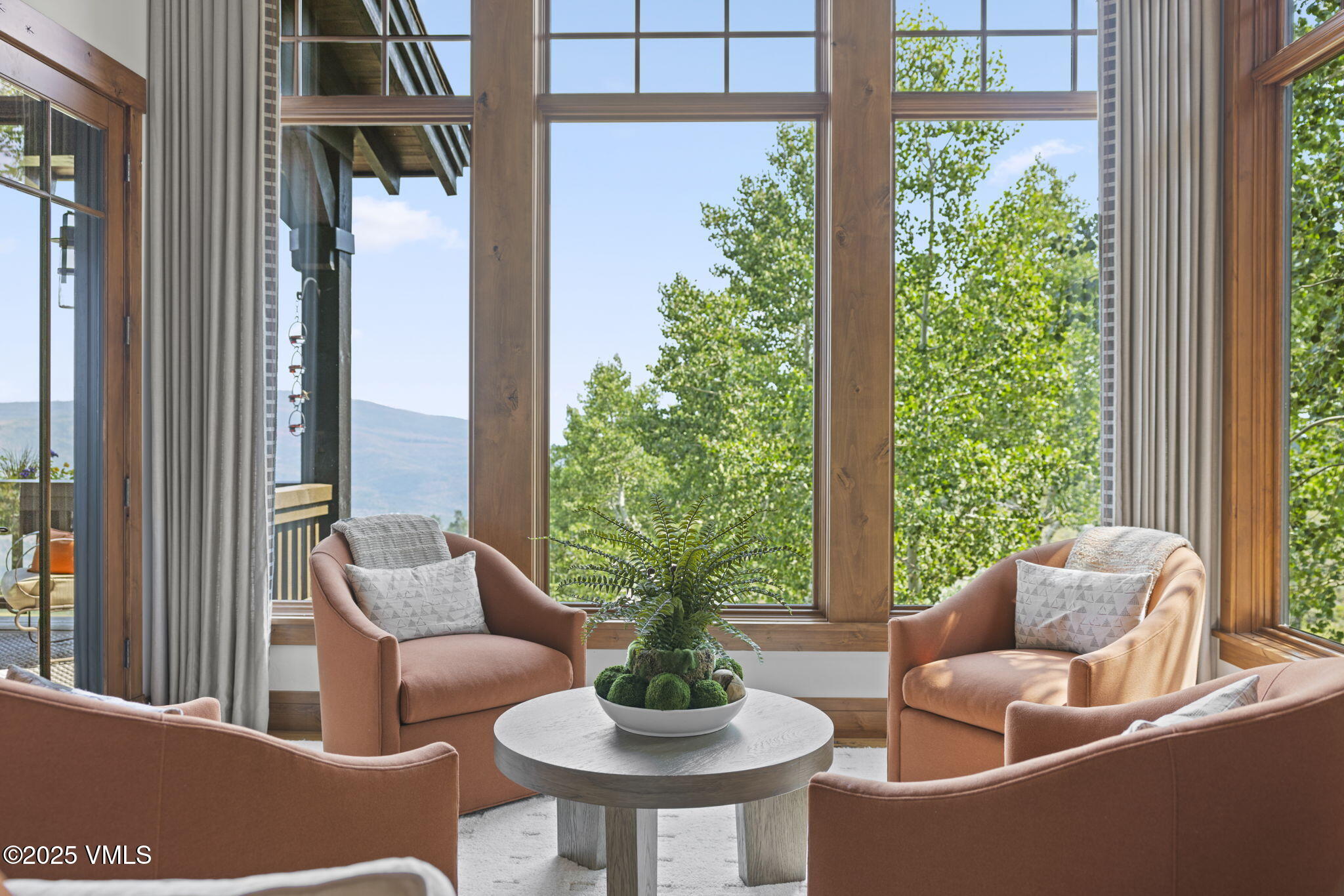 254 Pine Marten Way Edwards, CO 81632 - Photo 9 of 46 a living room with furniture and a large window