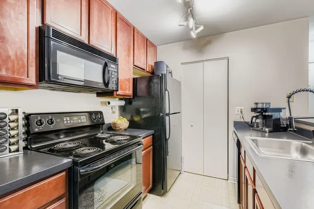 a kitchen with a stove and a microwave