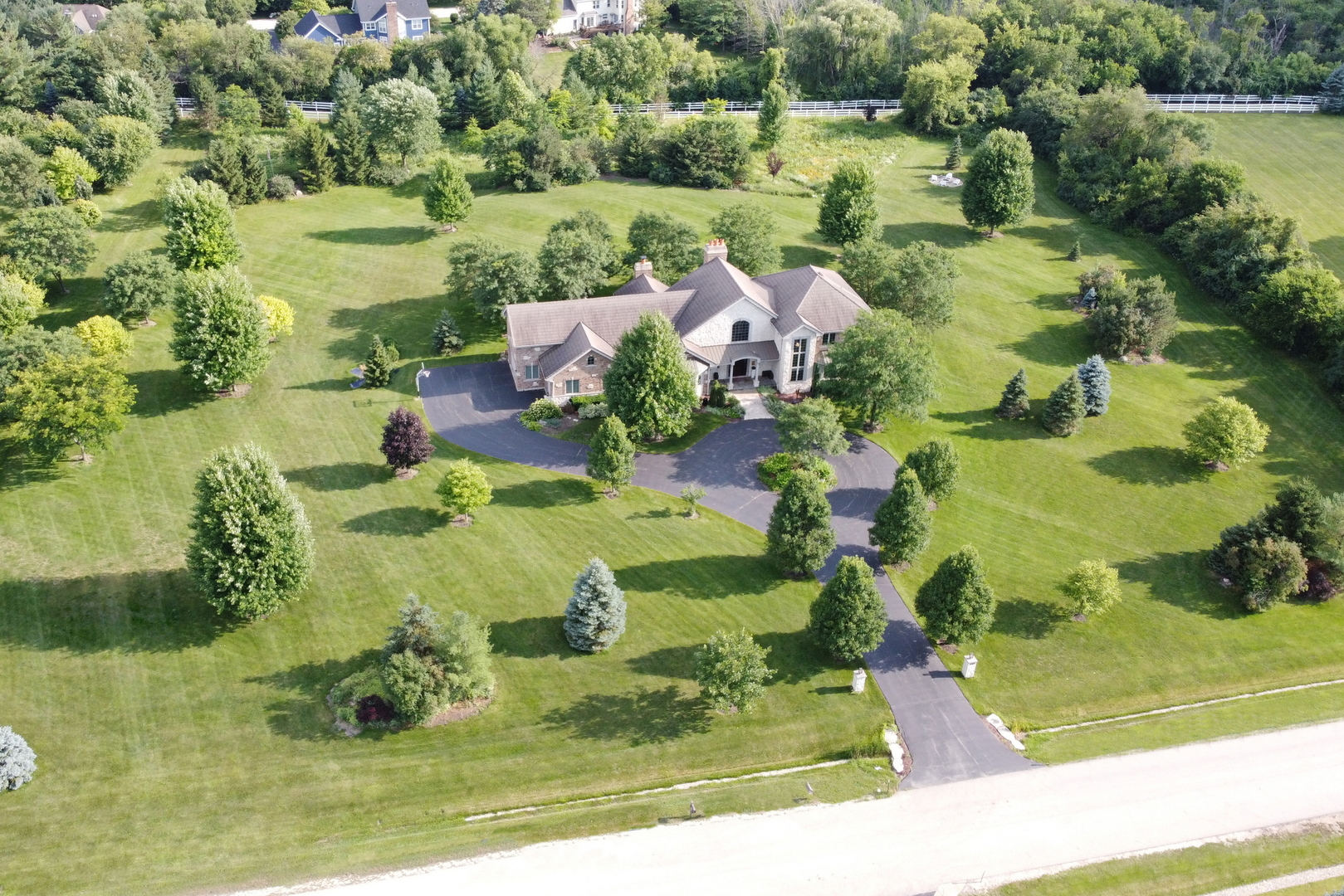 17451 Bridle Trail Road Gurnee, IL 60031 - Photo 13 of 50 a view of a lake with a houses