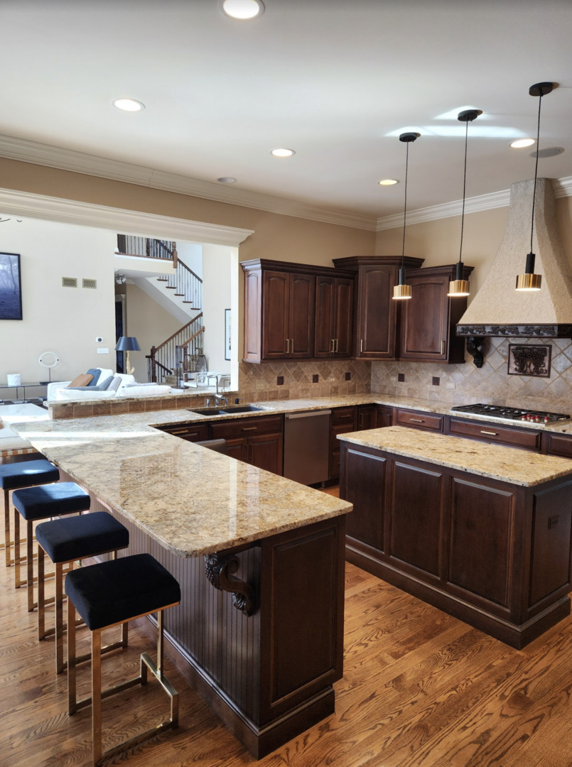 17451 Bridle Trail Road Gurnee, IL 60031 - Photo 19 of 50 a kitchen with stainless steel appliances granite countertop a stove a sink and a refrigerator