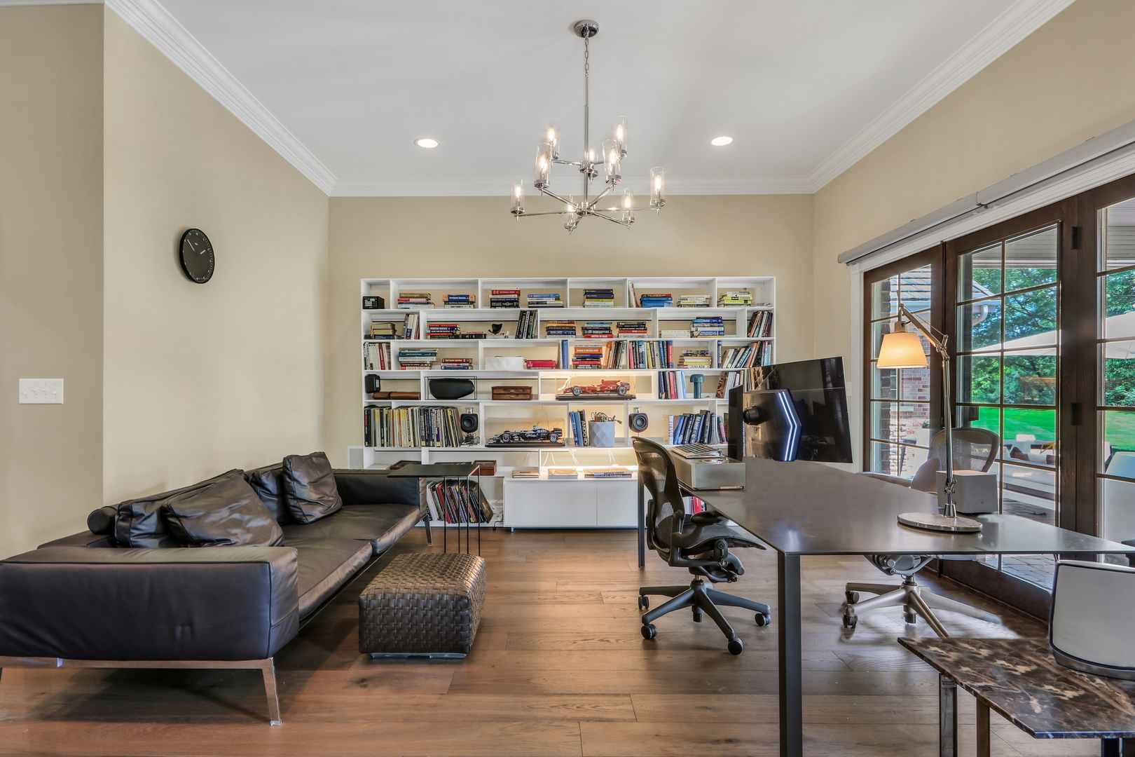17451 Bridle Trail Road Gurnee, IL 60031 - Photo 27 of 50 a living room with furniture and a chandelier