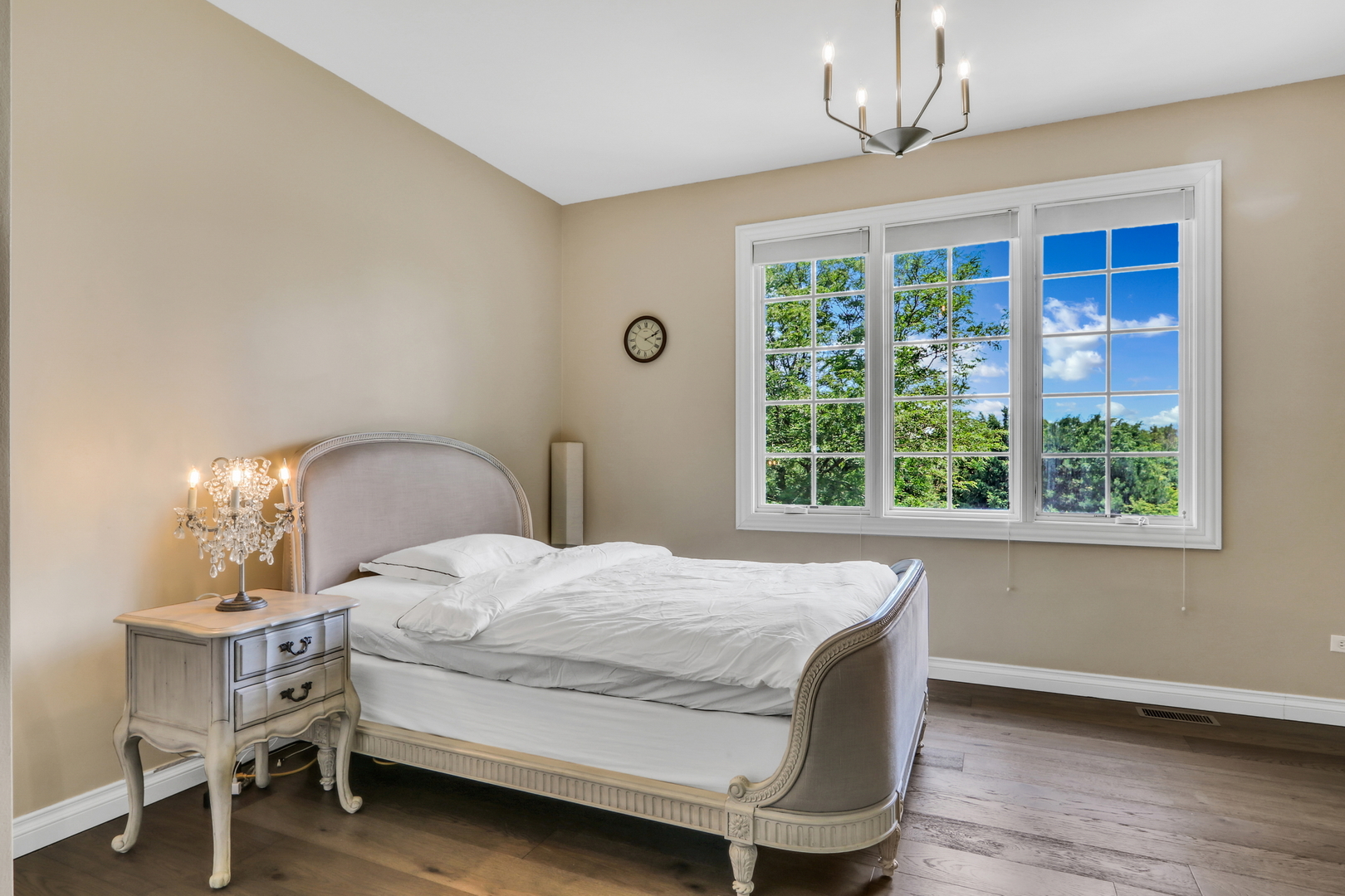 17451 Bridle Trail Road Gurnee, IL 60031 - Photo 32 of 50 a bedroom with a bed table and window