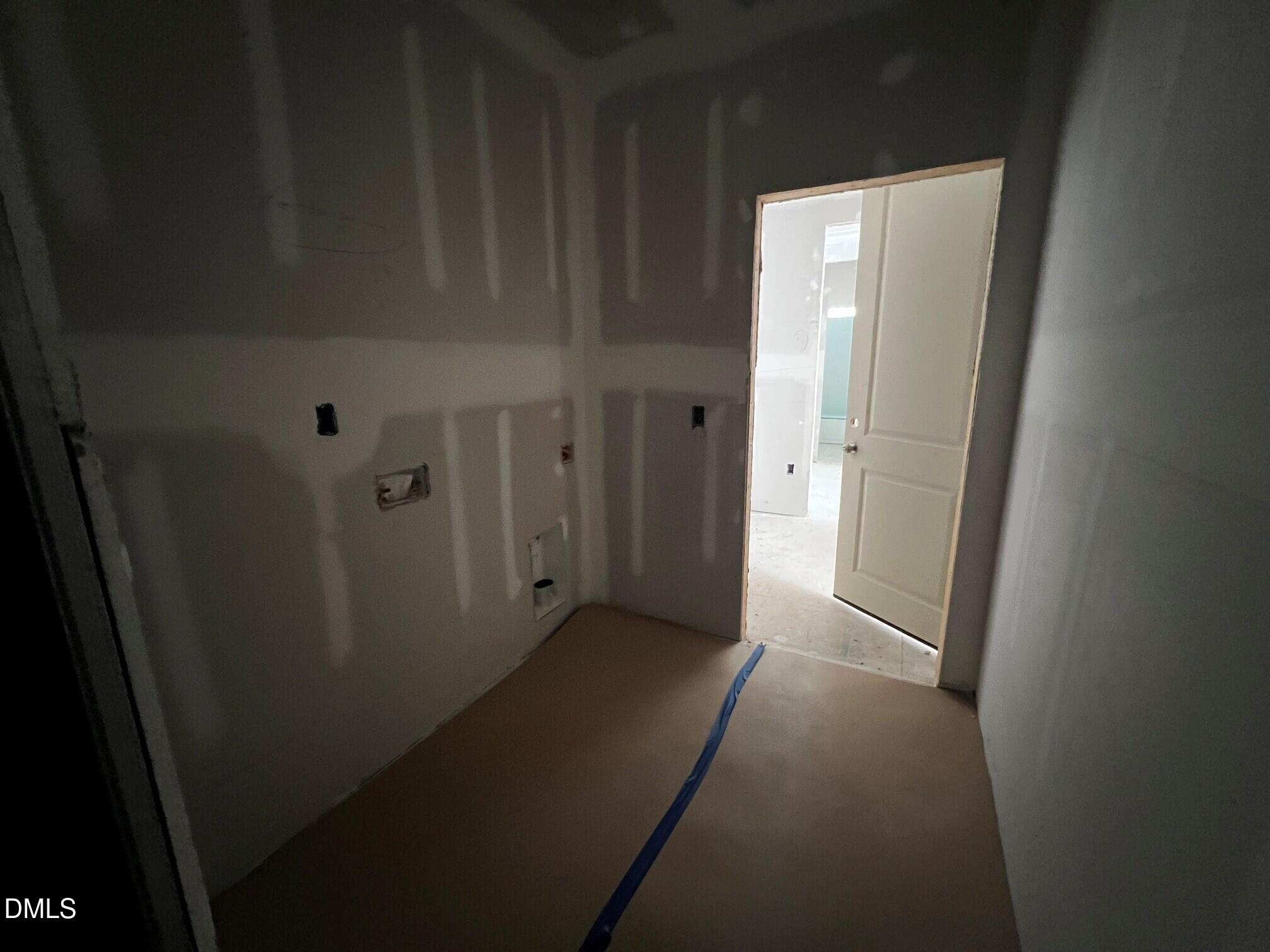 6055 Scalybark Road Durham, NC 27712 - Photo 9 of 29 main floor laundry room