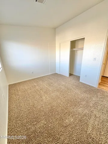 an empty room with a natural light