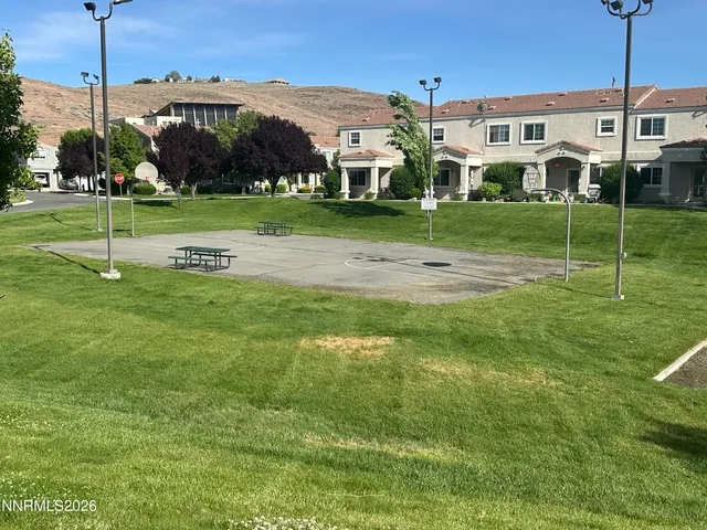 a view of a golf course with a lake