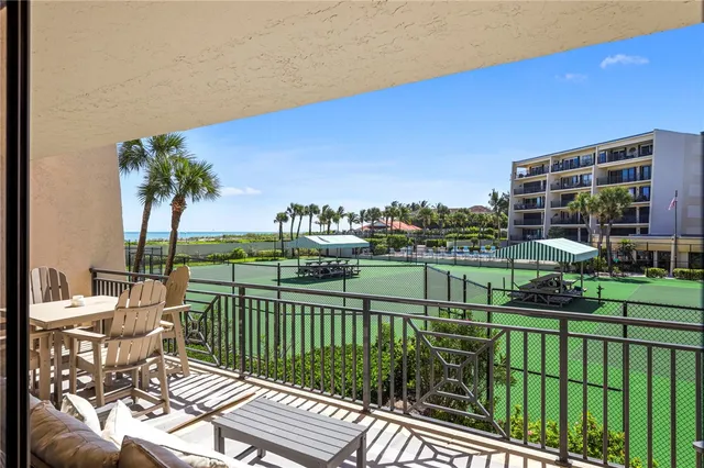 a view of balcony with furniture