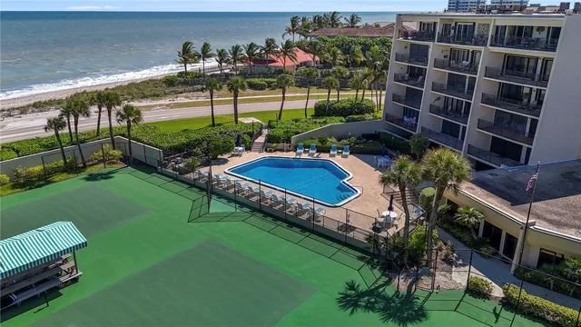 a view of yard with outdoor seating and green space