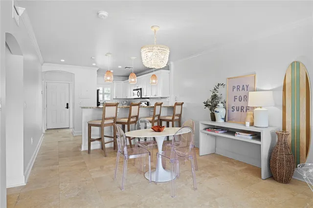 a view of a dining room with furniture