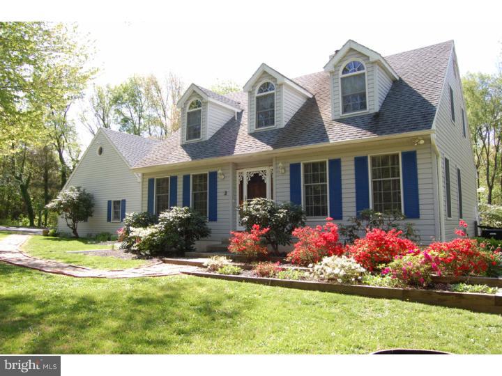 1264 St Peters Road Pottstown, PA 19465 - Photo 1 of 18 a front view of a house with yard and flowers