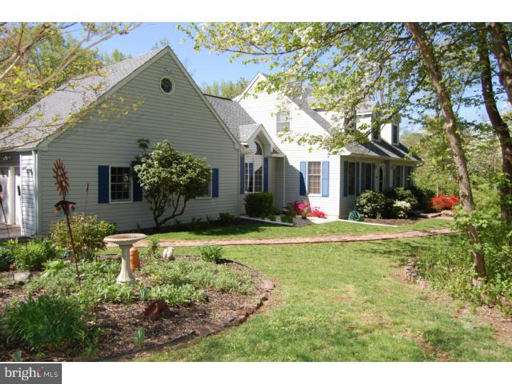 1264 St Peters Road Pottstown, PA 19465 - Photo 4 of 18 a front view of a house with garden