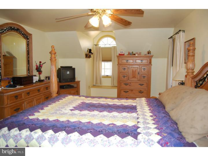 1264 St Peters Road Pottstown, PA 19465 - Photo 9 of 18 a bedroom with a bed and a dresser