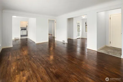 a view of a livingroom with wooden floor